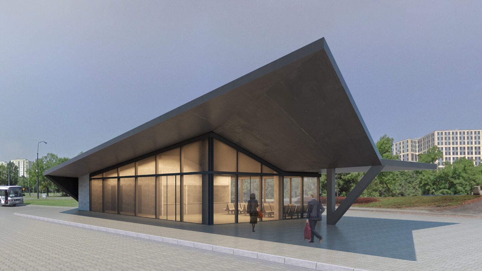 Nowoczesny budynek dworca autobusowego o charakterystycznym, asymetrycznym dachu, z dużymi przeszkleniami. Wewnątrz widać minimalistycznie zaprojektowaną poczekalnię. Budynek otoczony jest zielenią, a w tle znajdują się wysokie bloki mieszkalne.