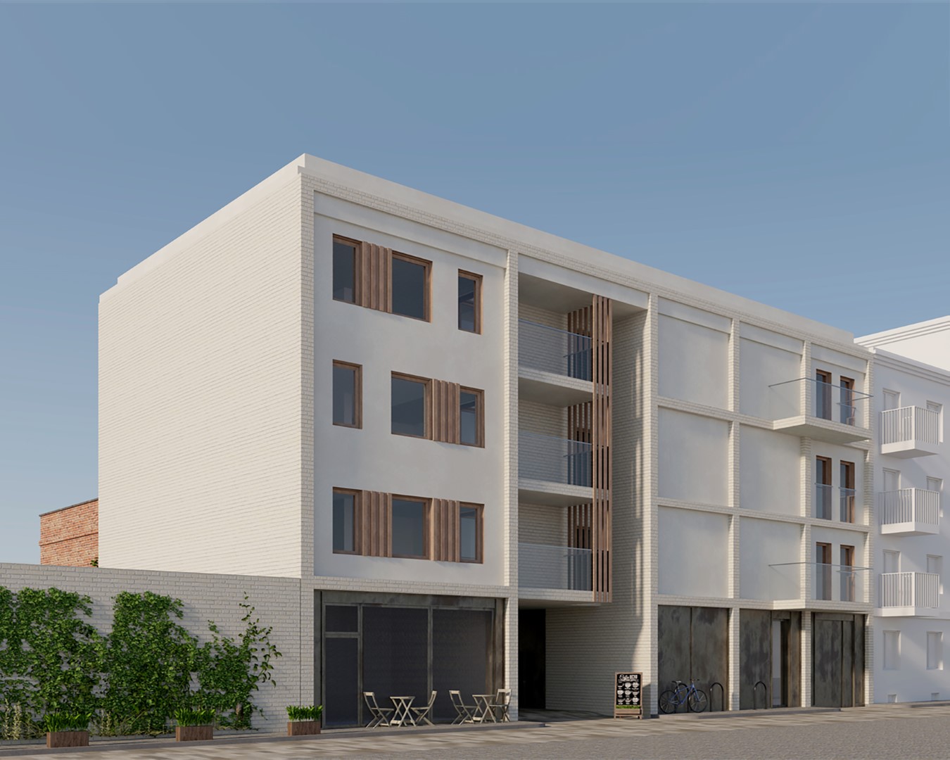 nowoczesny budynek mieszkalny o jasnej elewacji i drewnianych akcentach w oknach i balkonach. Parter mieści duże przeszklone witryny, a otoczenie wzbogaca zieleń oraz miejsce do odpoczynku z krzesłami. Budynek ma minimalistyczny charakter.